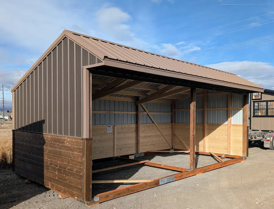Run-in shelter with open overhang front, standing on its own on the property